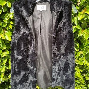 100% polyester fur vest in a medium